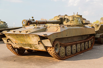 Fototapeta na wymiar Old fighting Soviet tank. A look with a side