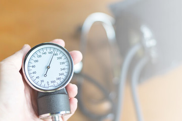 World hypertension day on May 17th with sphygmomanometer for blood pressure measure and bp is high to indicate 180 mmHg