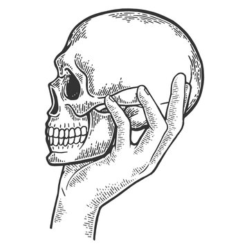 Human skull in hand sketch engraving vector illustration. Scratch board style imitation. Black and white hand drawn image.