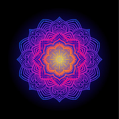 Mandala pattern design on black backdrop.