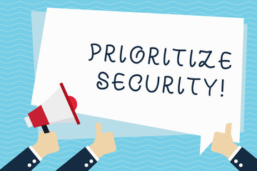 Conceptual hand writing showing Prioritize Security. Concept meaning designate security risk as more important to solve Hand Holding Megaphone and Gesturing Thumbs Up Text Balloon