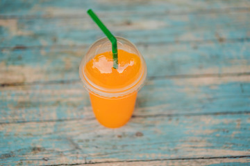 Still Life Glass of Fresh Orange Juice on Vintage Wood Table with Copy Space Background