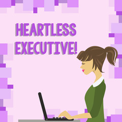 Word writing text Heartless Executive. Business photo showcasing workmate showing a lack of empathy or compassion photo of Young Busy Woman Sitting Side View and Working on her Laptop