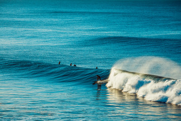 Surfers and Waves at Bells Beach, Australia