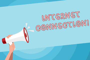 Text sign showing Internet Connection. Business photo text The way one gains access or connection to the Internet Human Hand Holding Tightly a Megaphone with Sound Icon and Blank Text Space