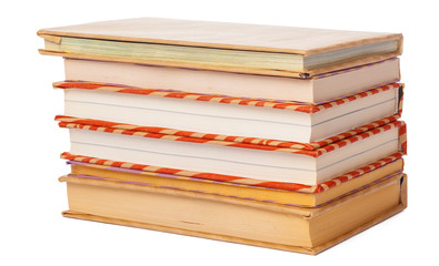 pile of books isolated on white background