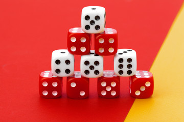 Gaming dice on color background