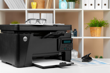 Printer, copier, scanner in office. Workplace.