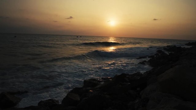 Ocean Foamy Waves at Sunset