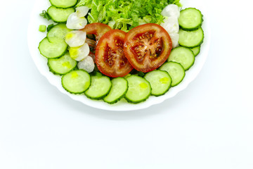 Nutritious vitamin vegetable salad - tomatoes, cucumbers, radishes, Chinese cabbage, dill, parsley, green onions. Around the pink measuring tape