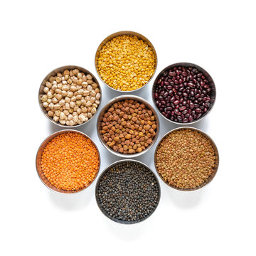 Chickpea, Red Lentil, Split Chickpea, Black gram,  Black lentil, Garbanzo Beans, Horse Gram, Gahat Dal in steel bowel isolated on white background.
