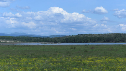 landscape with lake and blue sky