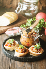 Bread toasts with eggplant caviar. Vegetable appetizer or antipasti. Healthy food for vegetarian