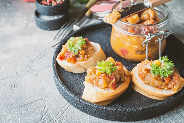 Bread toasts with eggplant caviar. Vegetable appetizer or antipasti. Healthy food for vegetarian