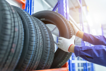 Tires in a tire store, Spare tire car, Seasonal tire change, Car maintenance and service center....