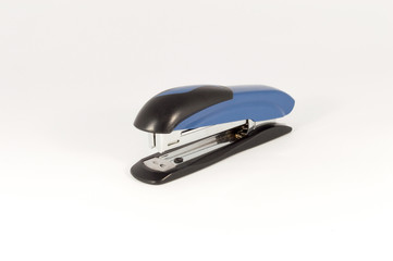 Black and blue stapler isolated on a white background