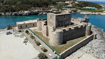 Brucoli castle fortress aerial view, panorama of the bay with blue sea and rocky coast around