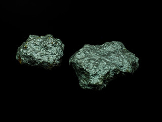 group of silver nuggets on blackground, precious stone
