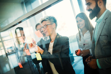 Business people planning strategy in office together