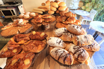 Tasty appetizing confectionery on a counter show window.