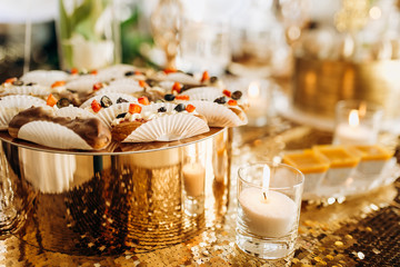 Delicious, colorful berry echlers on a golden stand