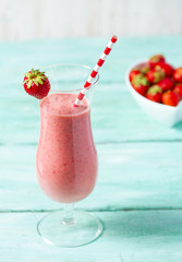 strawberry milk shake on wooden surface