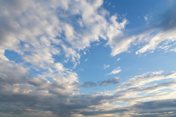 blue sky with tiny clouds