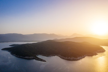 aerial sunset sea islands. Stuning view to Greek islands next to Poros.