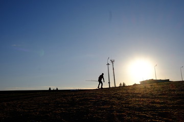 Fototapeta na wymiar silhouette of windmill at sunset