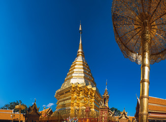 Fototapeta premium Golden mount at the Wat Phra That Doi Suthep, which is the major tourist destination in Chiang Mai, Thailand.