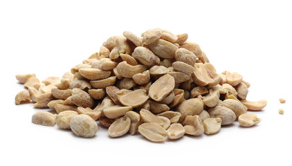 Dry roasted peanuts isolated on white background