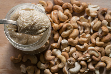 Peanut butter jar with cashew around