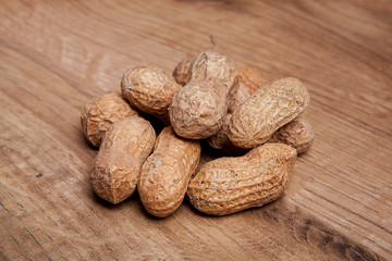 Peanut on wooden table.Healthy food and snack.