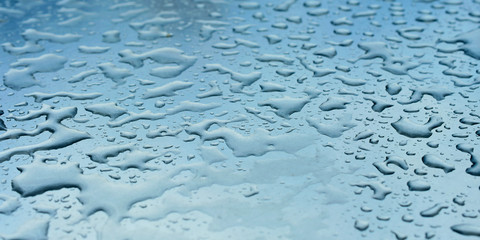 water drops on smooth surface in perspective, macro