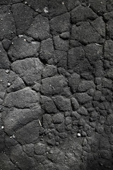 asphalt in cracks texture / abstract background cracks on asphalt road