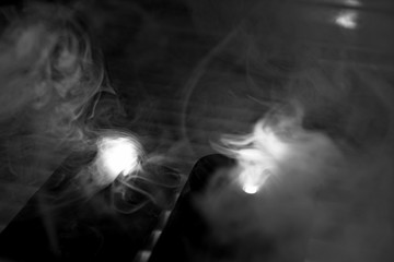 clouds of smoke, monochrome