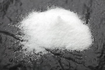 Salt on black background
