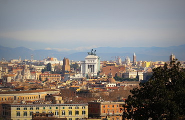 Panoramic view over the historic center of Rome, Italy from from Janiculum hill and terrace, with Vittoriano, Trinità dei Monti church and Quirinale palace.