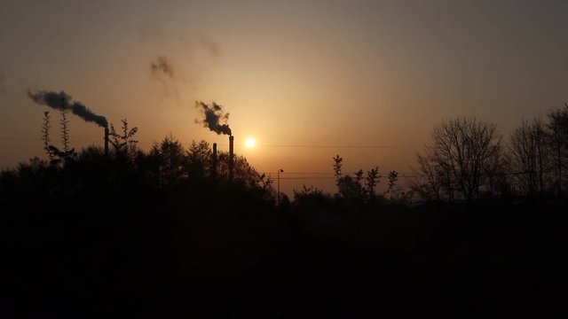 Timelapse of chimneys in morning light
