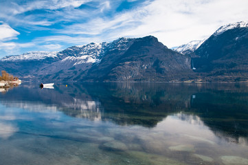 Mountains reflected in fjord