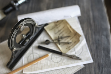drawing tools, concept engineering project vintage / compass pencil paper education drafting