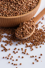 Grain buckwheat on a white acrylic background