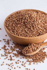 Grain buckwheat on a white acrylic background
