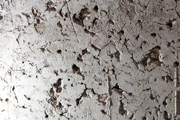 Wall of sand and concrete as an abstract background