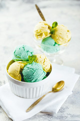 Ice cream with mint in ceramic bowl