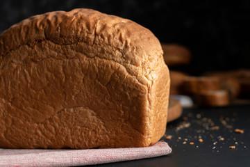fresh hot loaf of white bread at the kitchen, cooking healthy breakfast at the kitchens