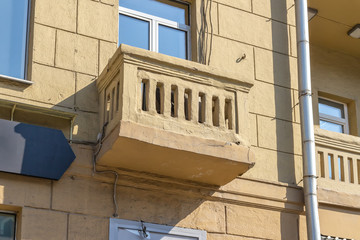 Balcony on the wall of the old house
