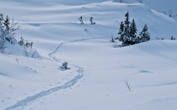 skiing in mountains