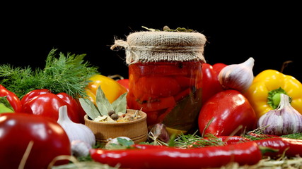 Bank with home preservation. Pepper, garlic, green dill