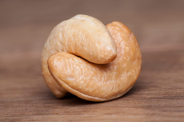 Cashew almond on wooden table.Healthy food and snack.